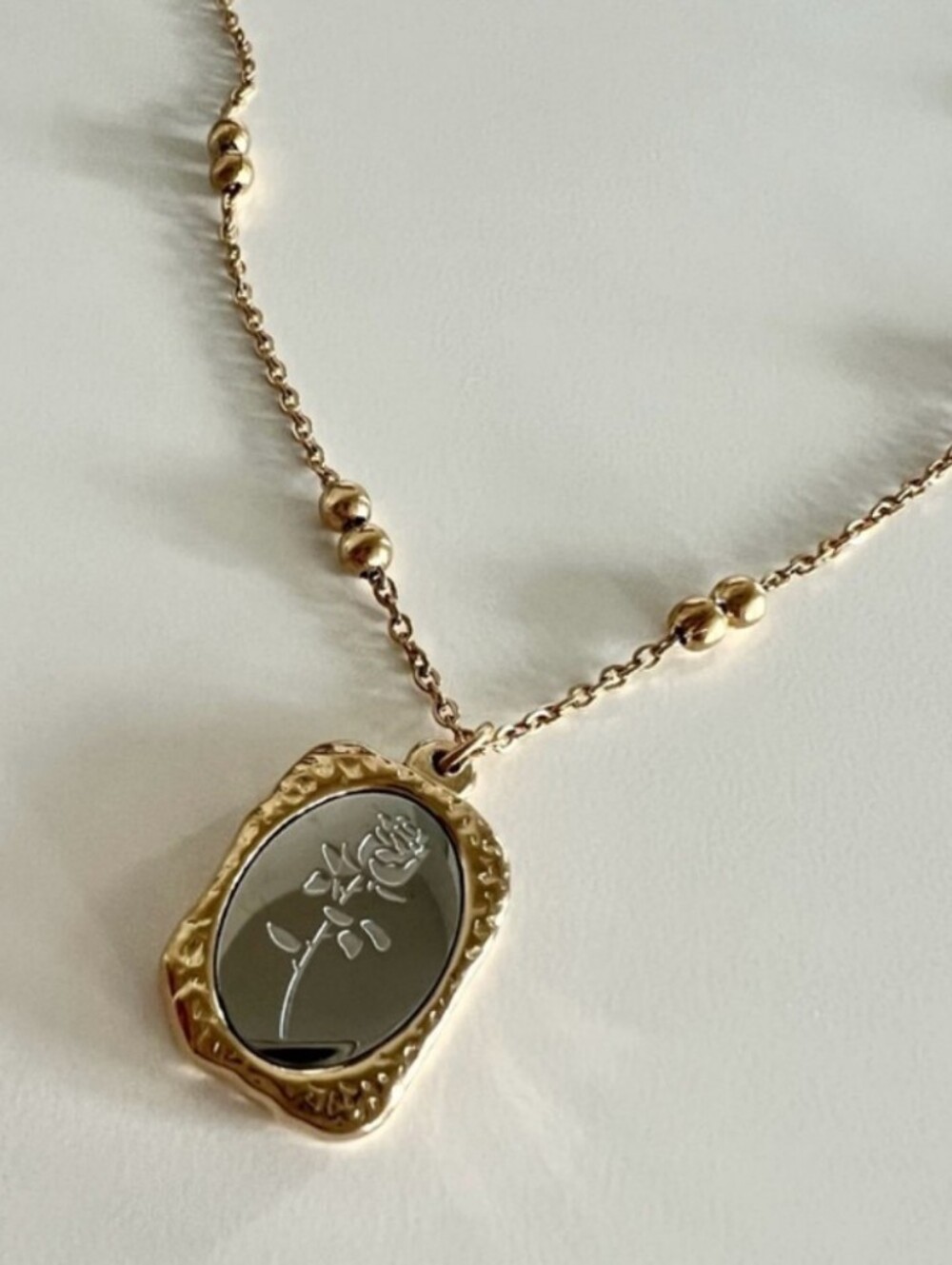 Plunder Gold-Tone Rose Engraved Pendant Necklace -